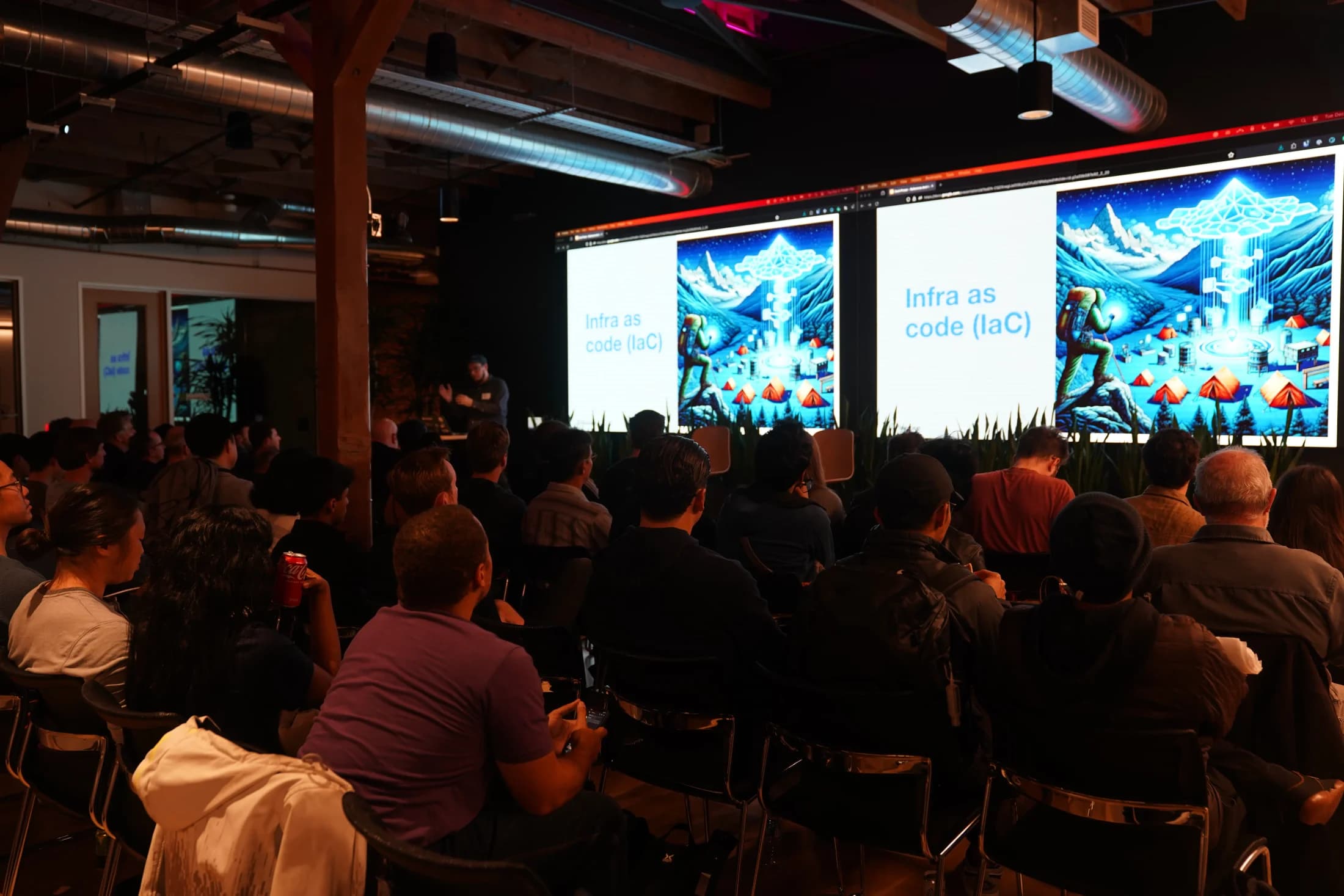 Zack presenting a production architecture talk to a full room at a16z.