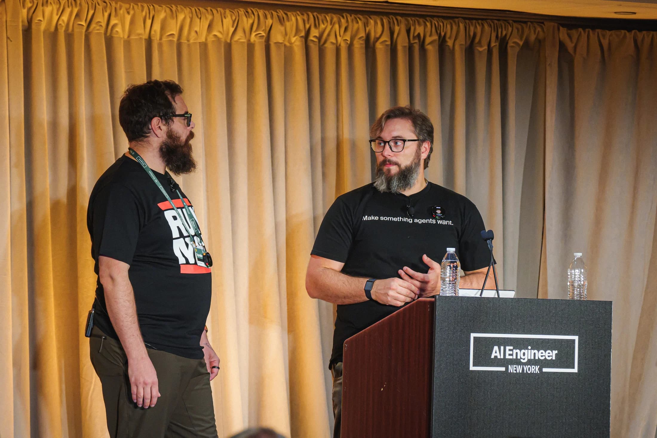 Zack and Nick discussing the workshop at the AI Engineer New York lectern.